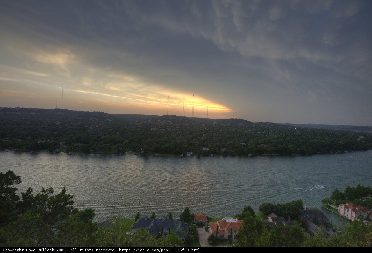 Stormy Skies Above Lakeside Homes