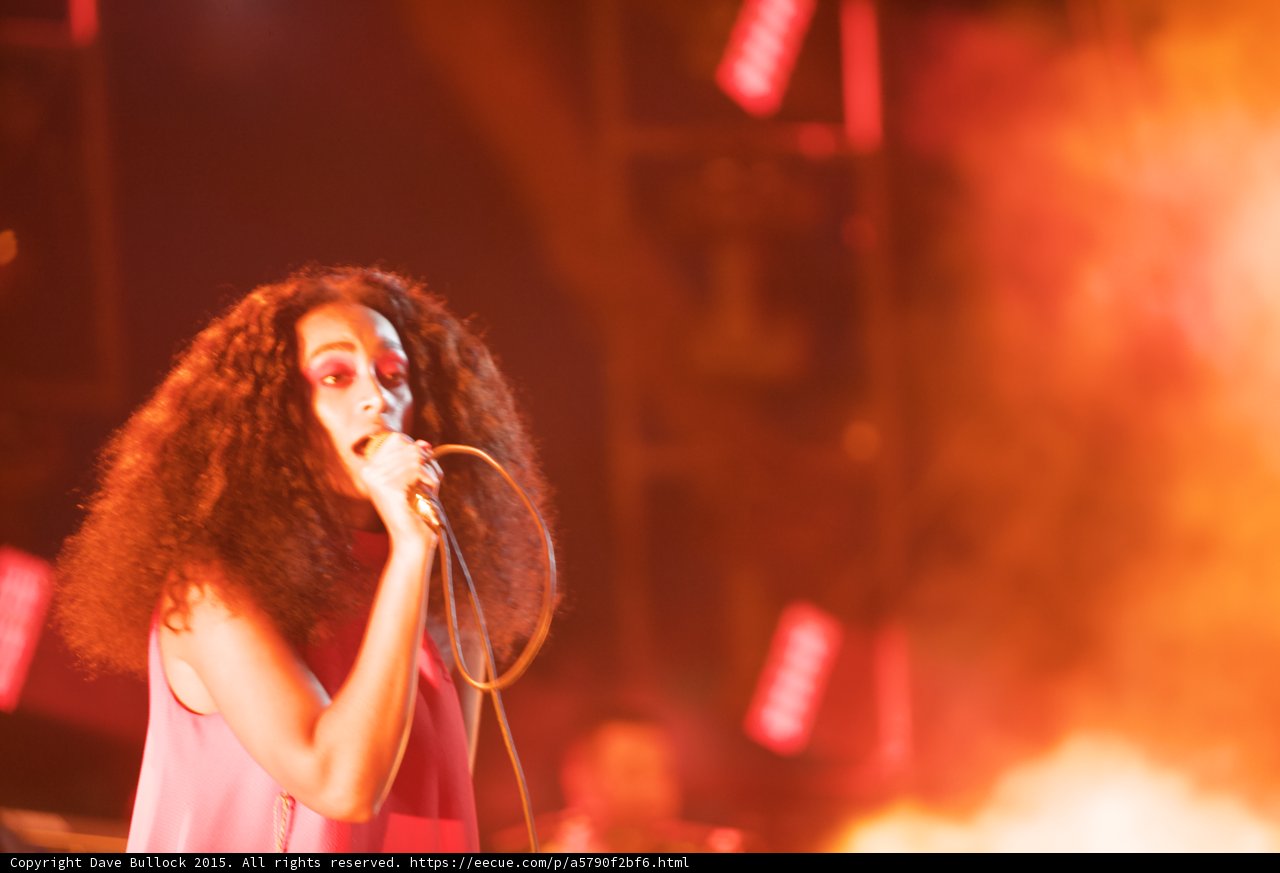 Solange Portrait Singing Forward Gaze Orange Smoke Atmospheric