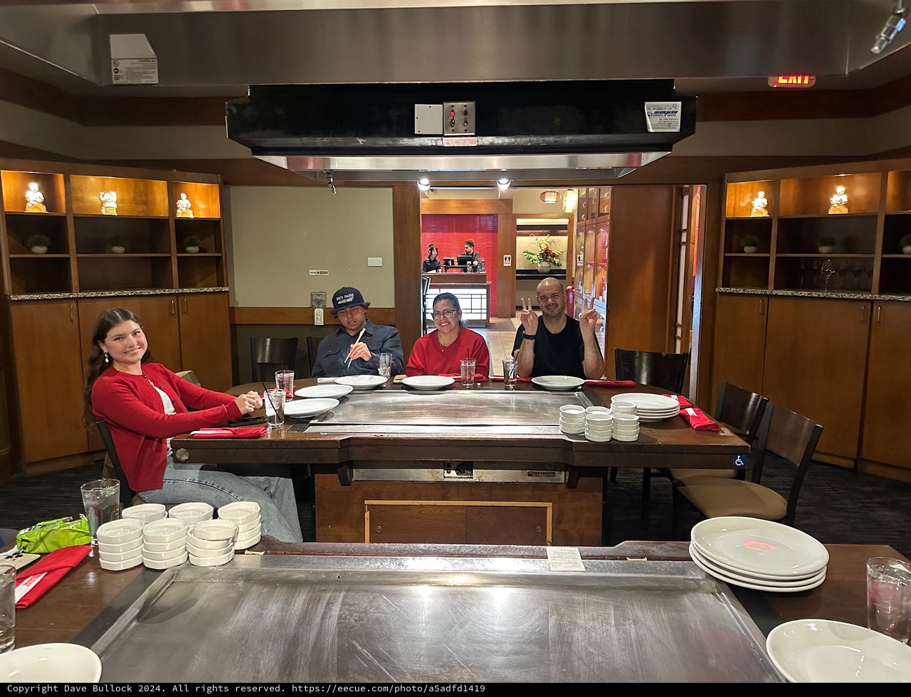 Friends Dining at Japanese Teppanyaki Restaurant
