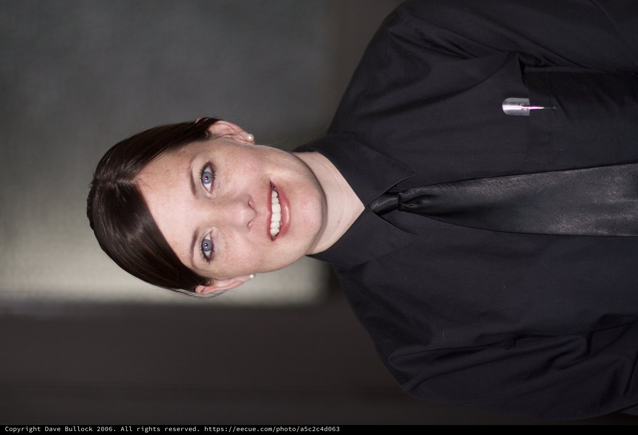 Professional Woman in Black Uniform Portrait