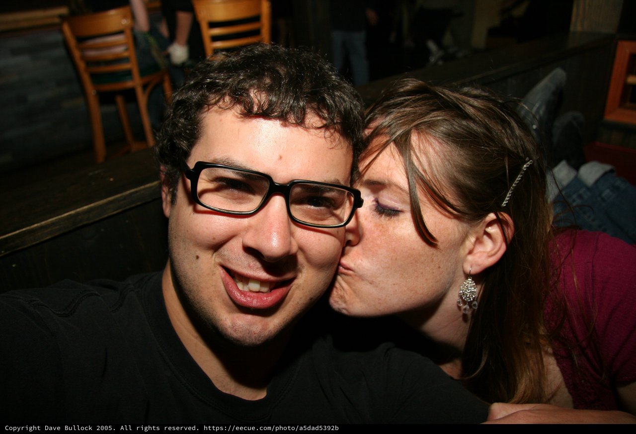 Spontaneous Cheek Kiss at a Bar in 2005