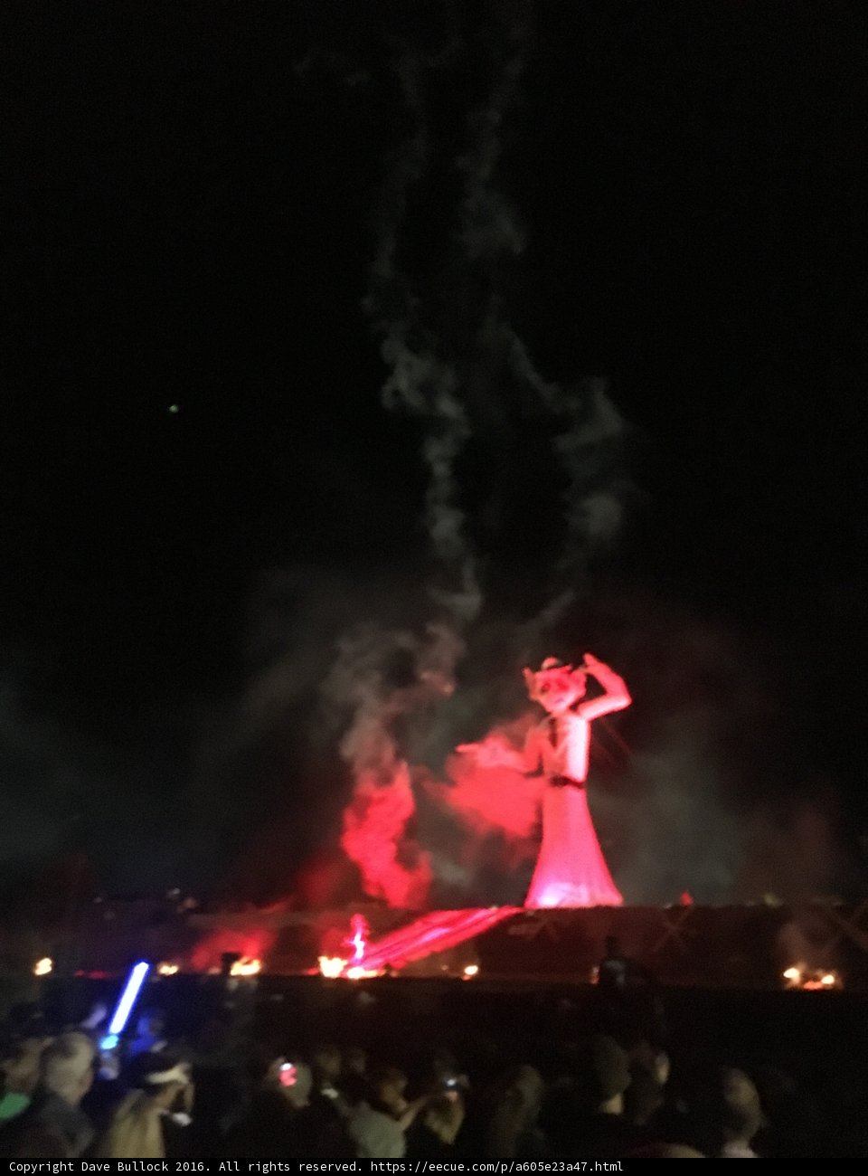 Fiery Statue at Night