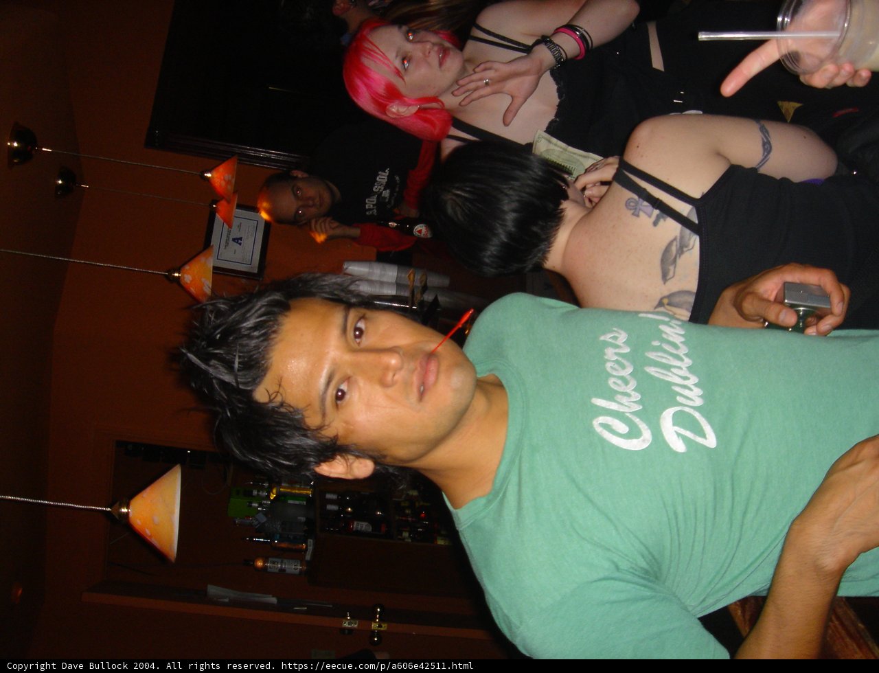 Green Shirted Man at the Urban Pub