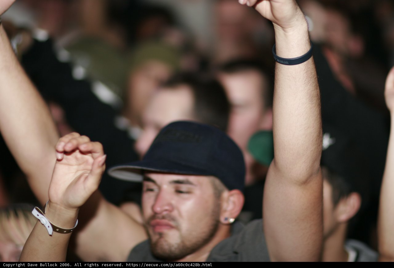 Black Shirted Man with Baseball Cap