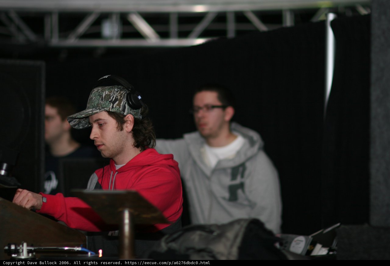 Musician in Red Hoodie and Hat