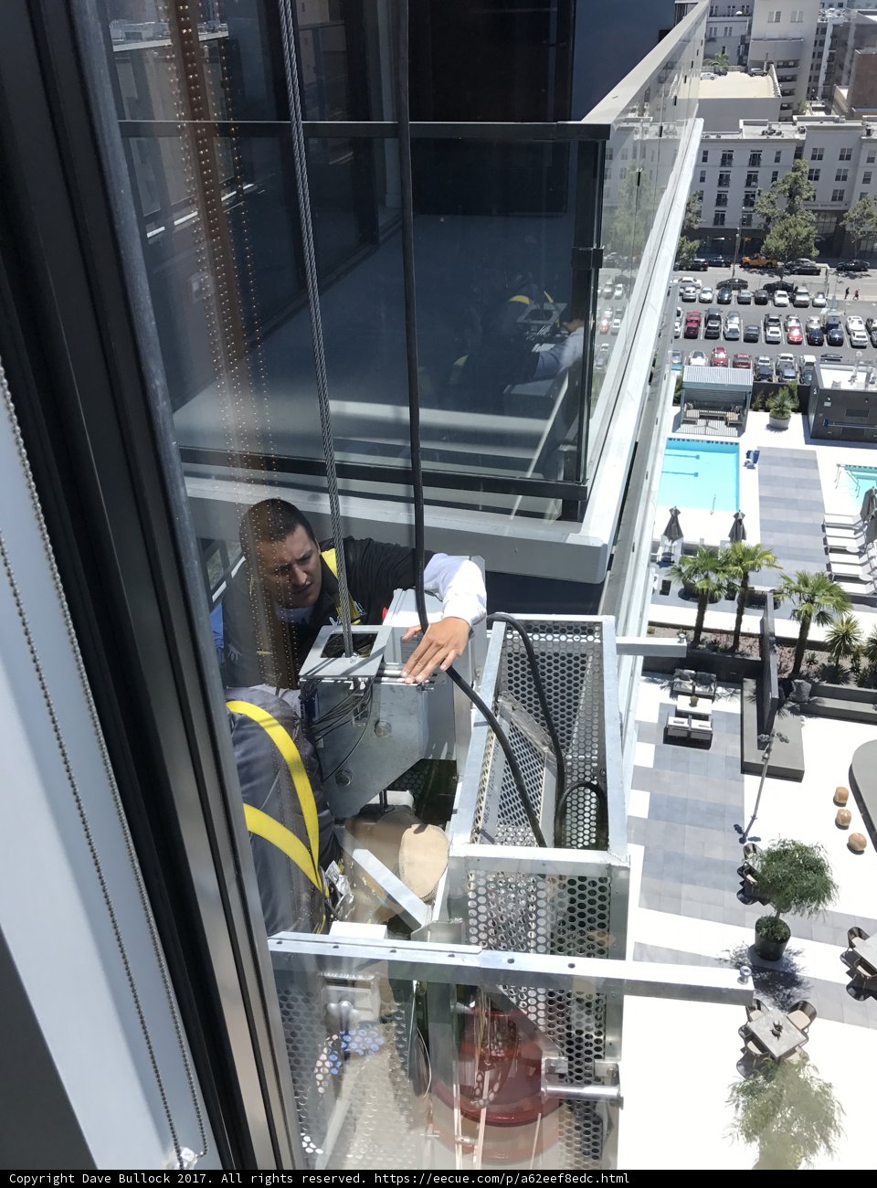 Working on a window in a busy metropolis