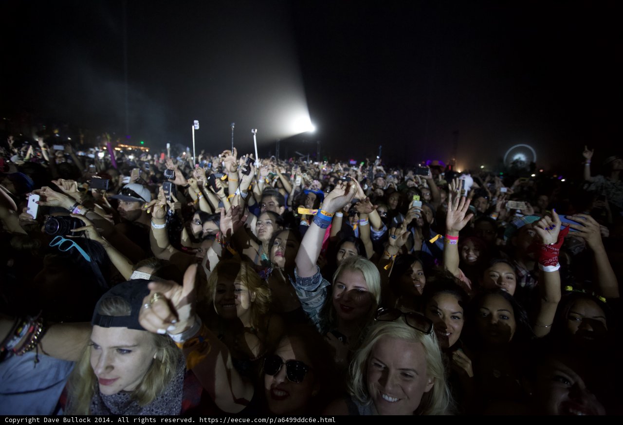 Hands Up in the Night Sky at Coachella