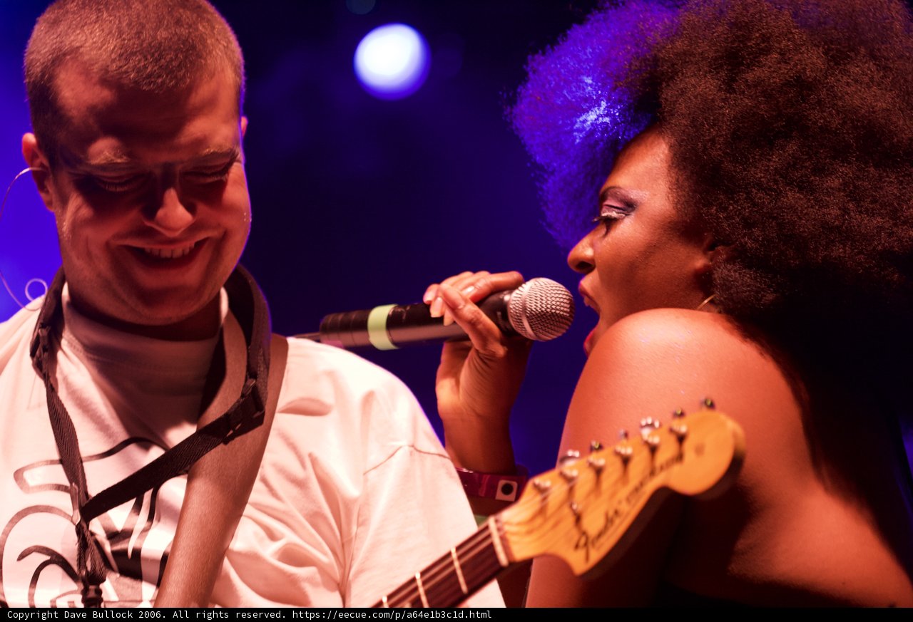 Entertainer Tommy Snider and partner singing at 2006 detour 3 album concert