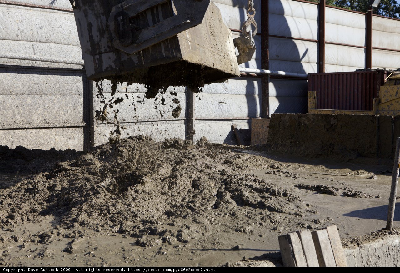 Massive Dump Truck Unloads Dirt