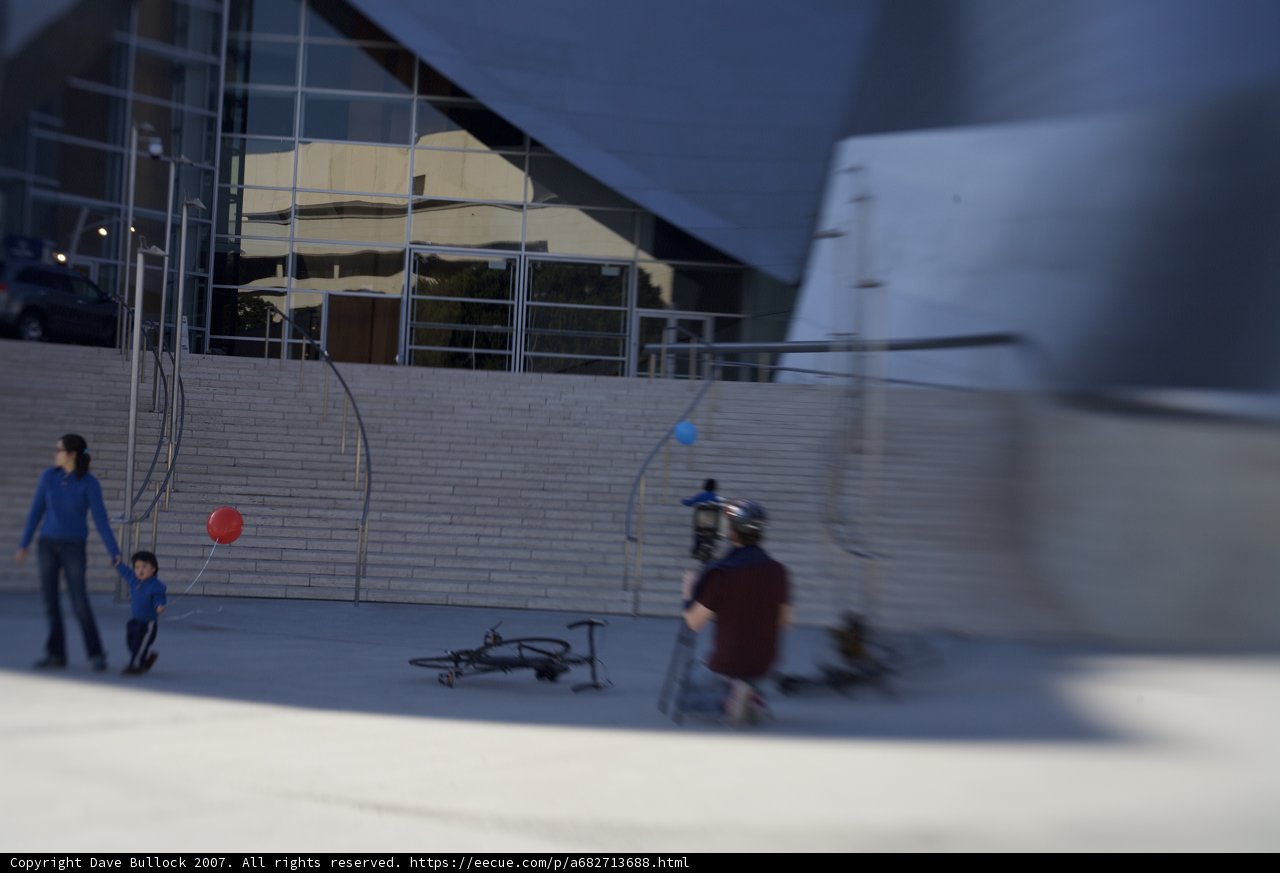 Blurry Family with Red Balloon