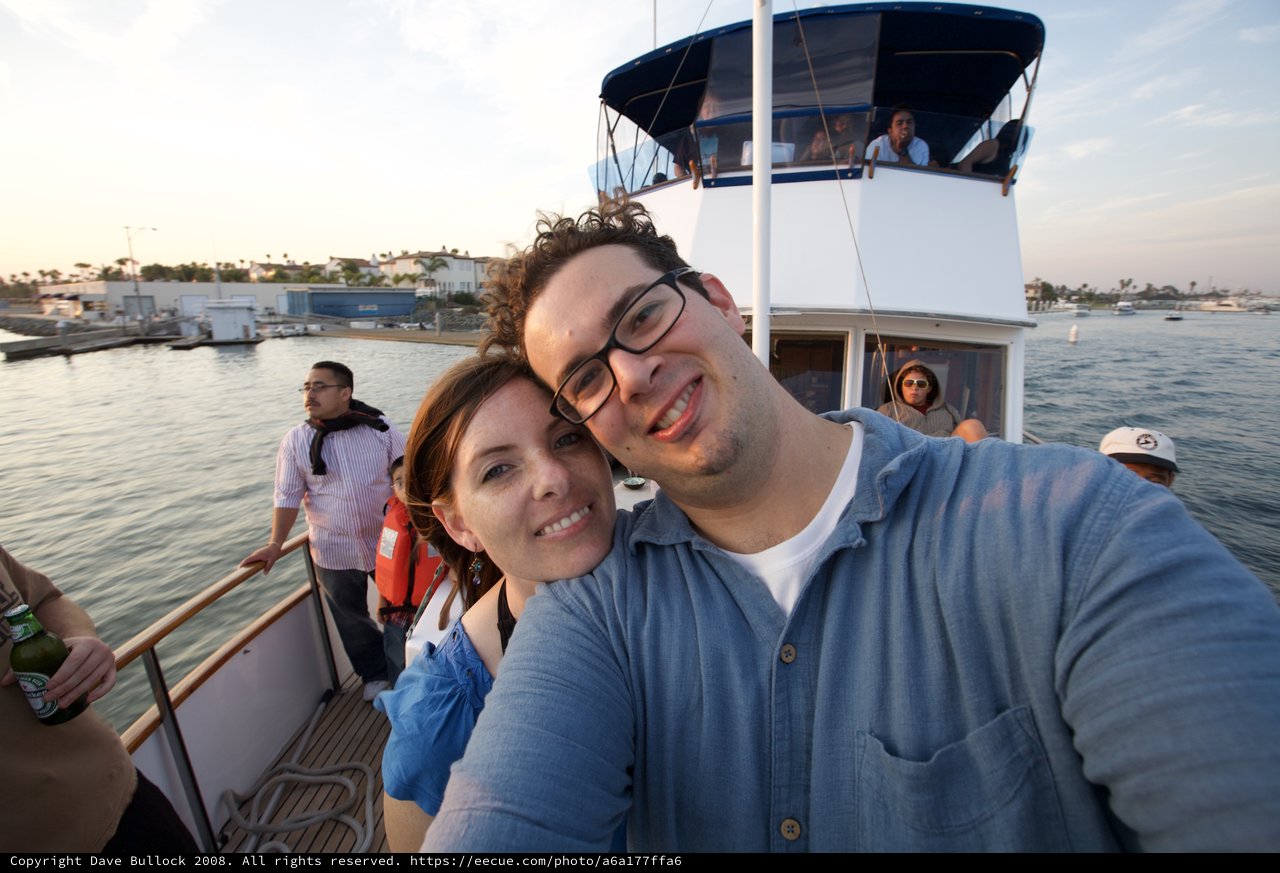 Couple's Selfie Aboard a Boat at Sunset