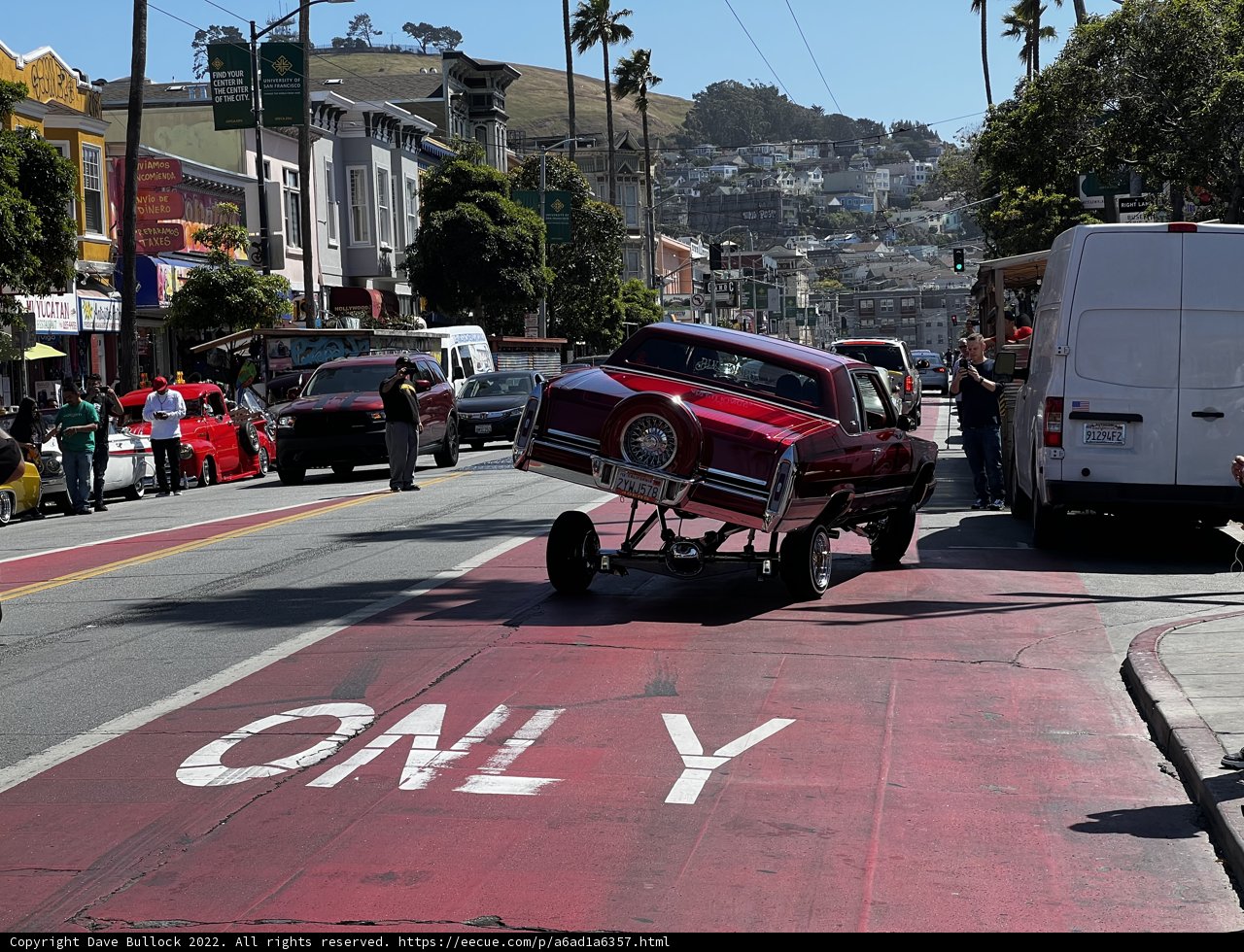 Red Car and Trailer on the Side of the Road