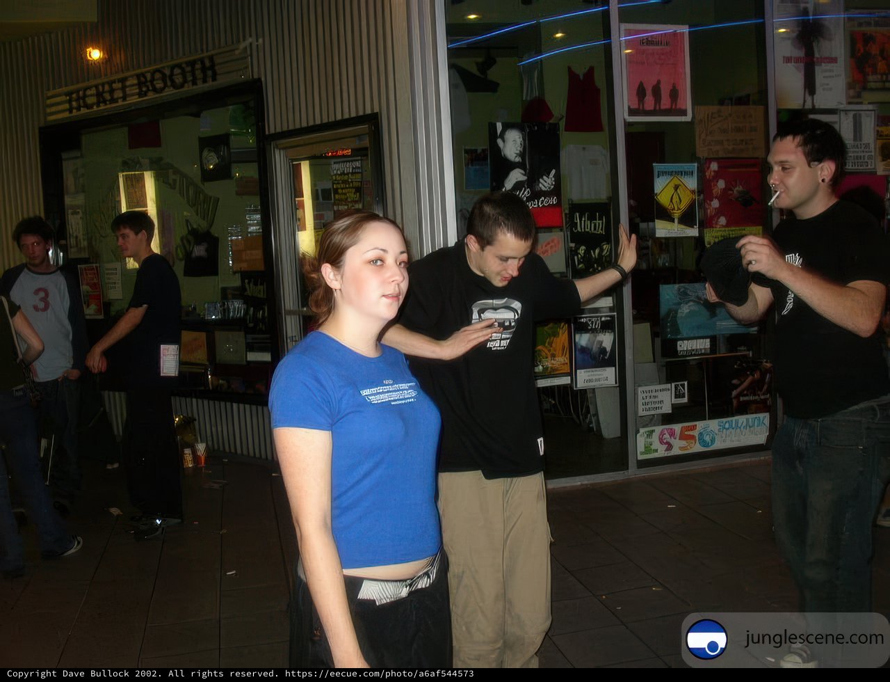 Group of 12 Teens and Adults outside Clothing Store