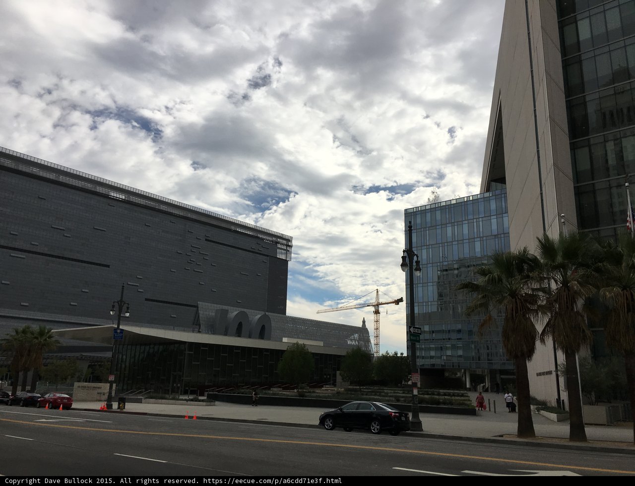 Parked Car in Front of Office Building
