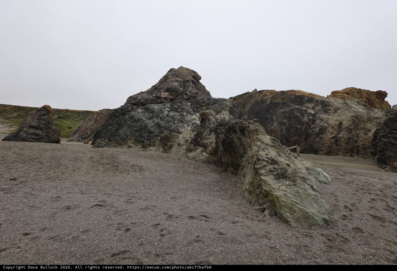 Ancient Coastal Rocks on a Misty California Beach