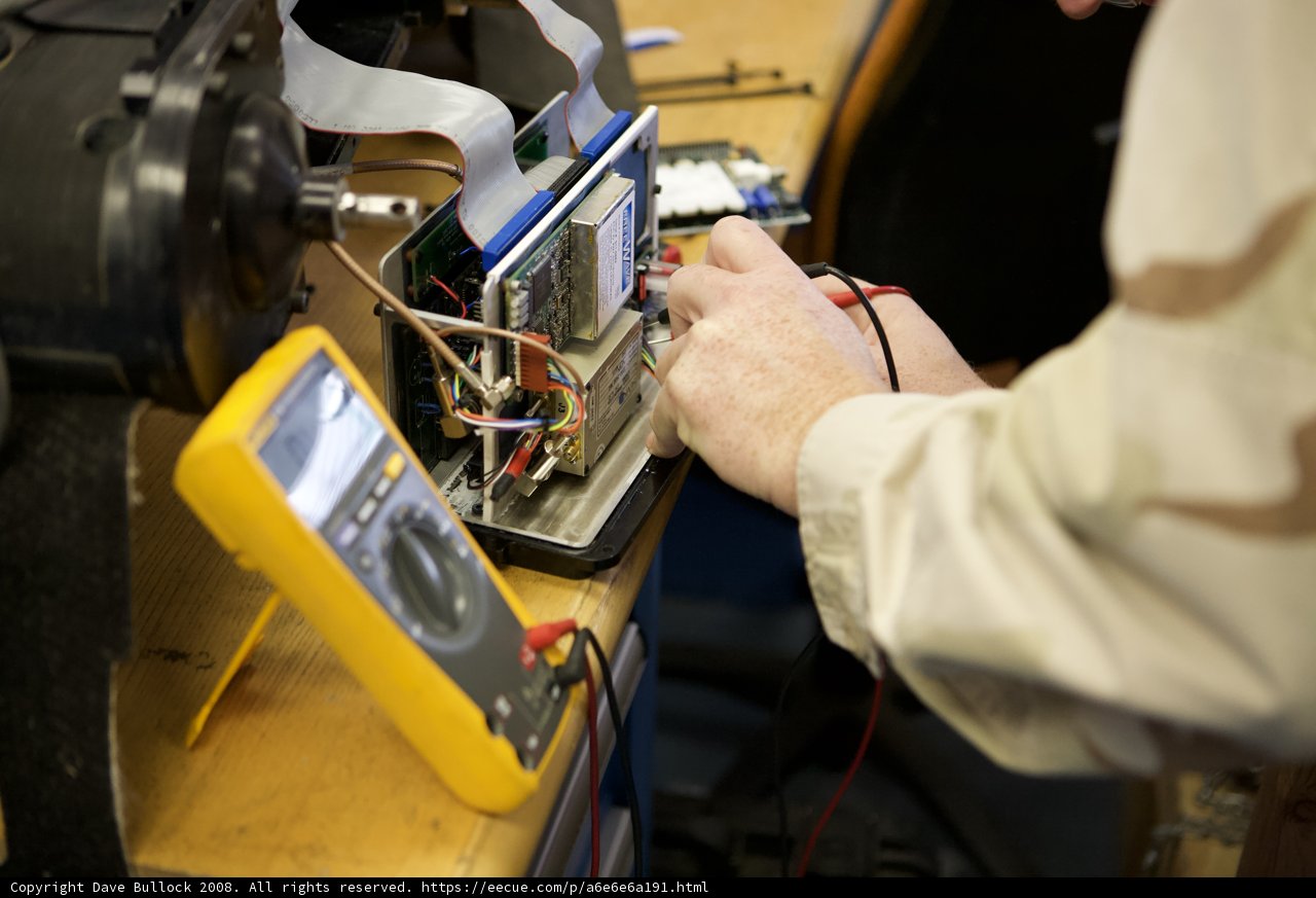 Working on Computer Wiring with a Multimeter