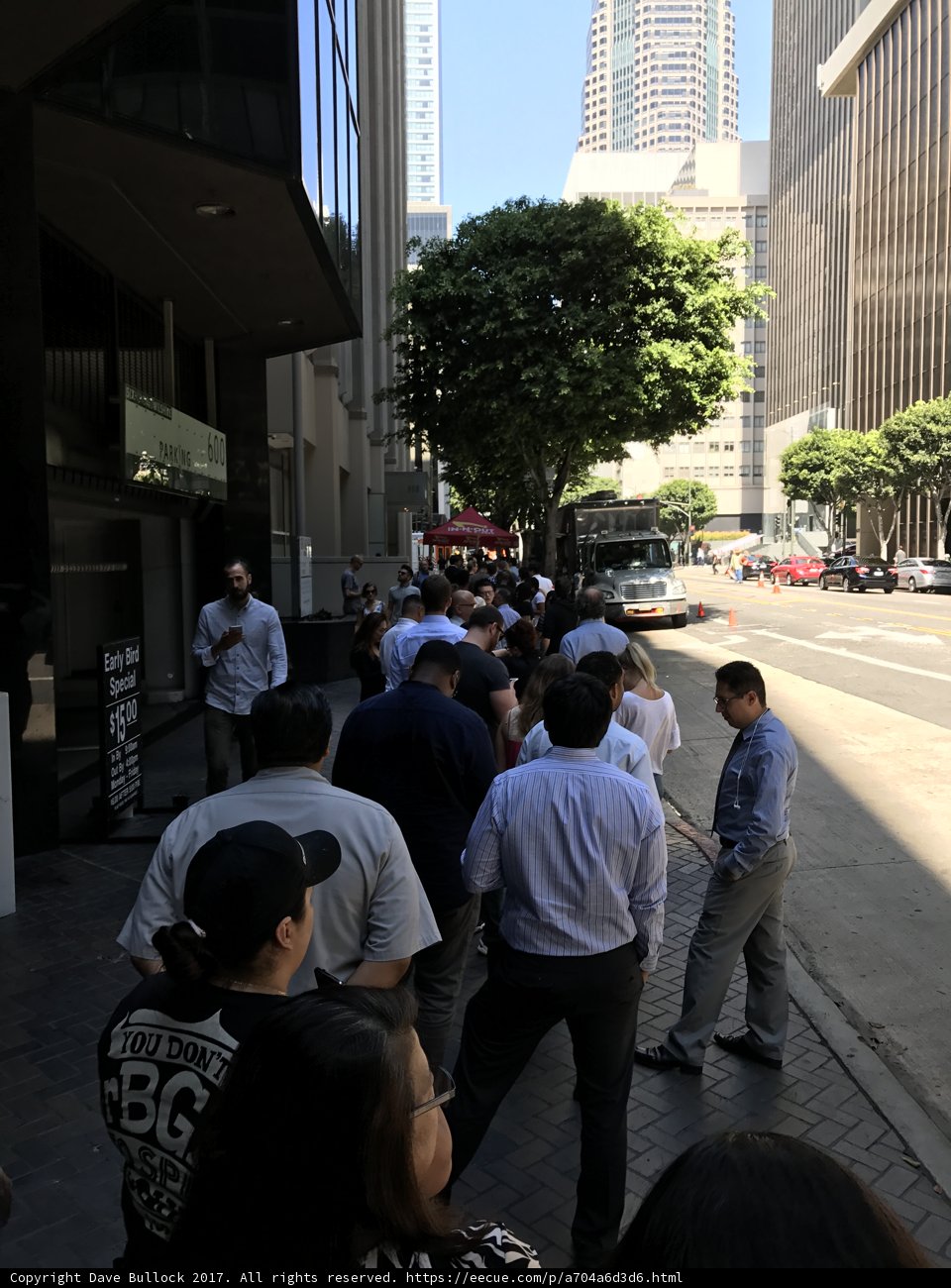 A Crowd Gathers at the Urban Building