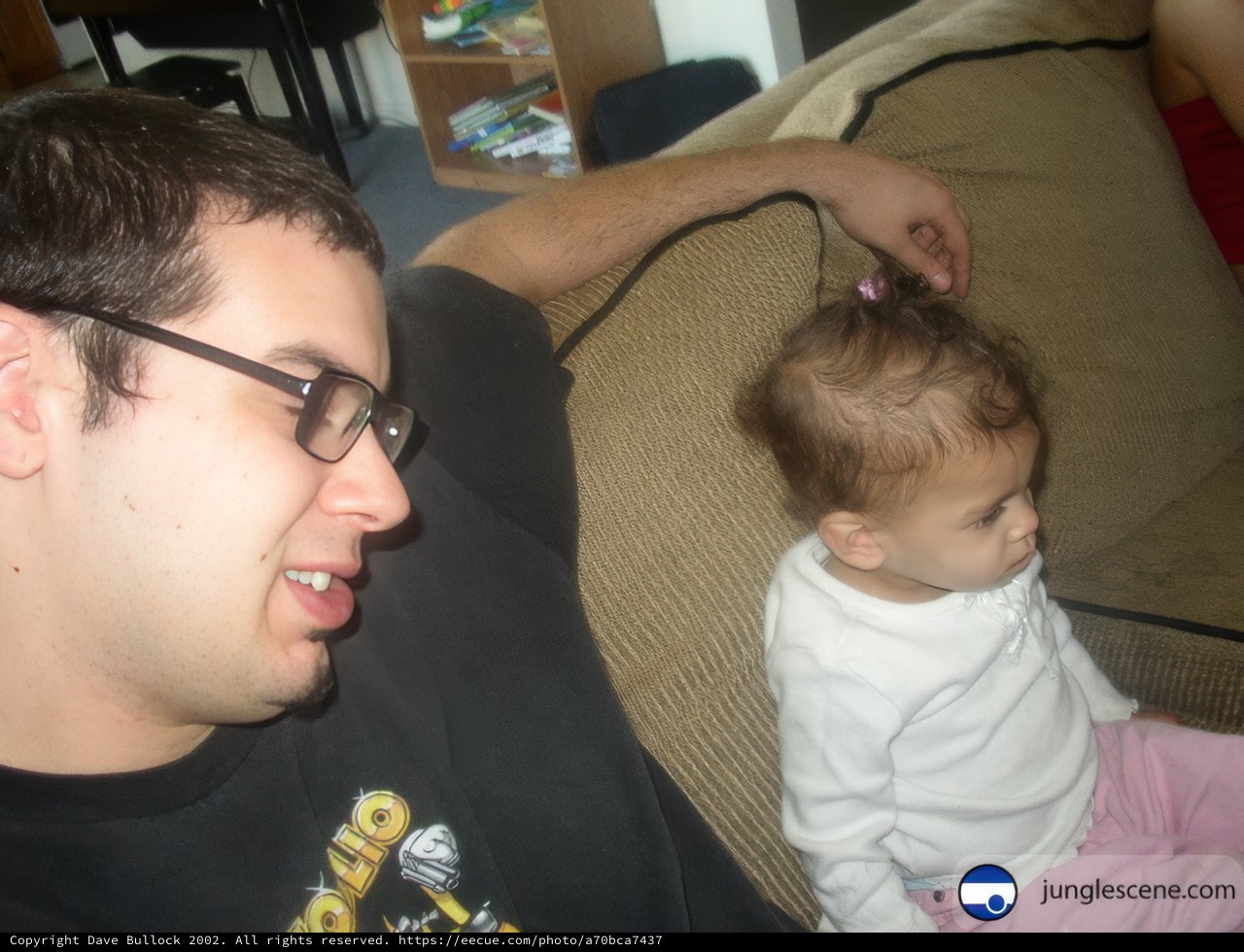 Father and Son Bonding on the Couch
