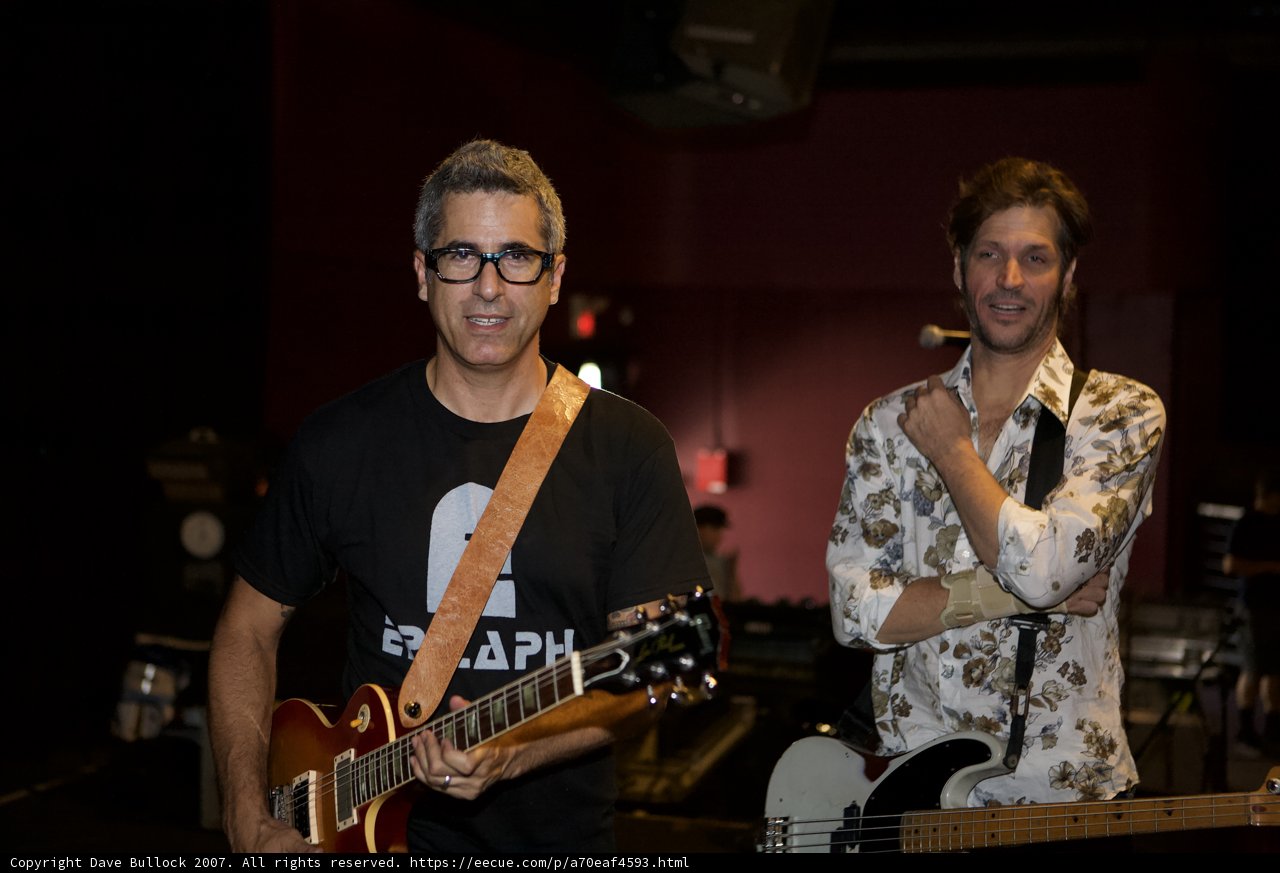 Bad Religion Glasshouse Concert: Two Guitarists in Black Shirts