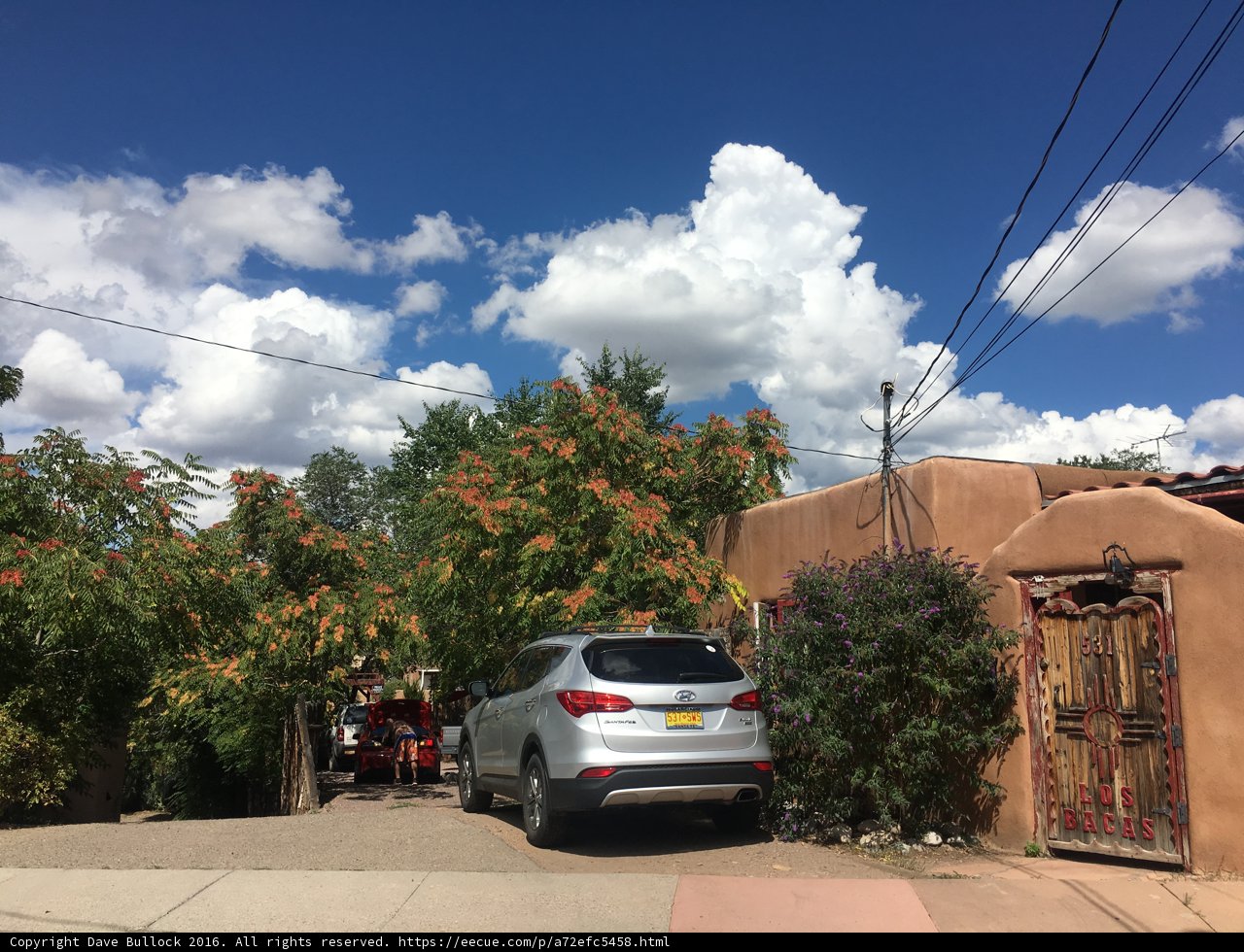 Coupe parked in front of Santa Fe home