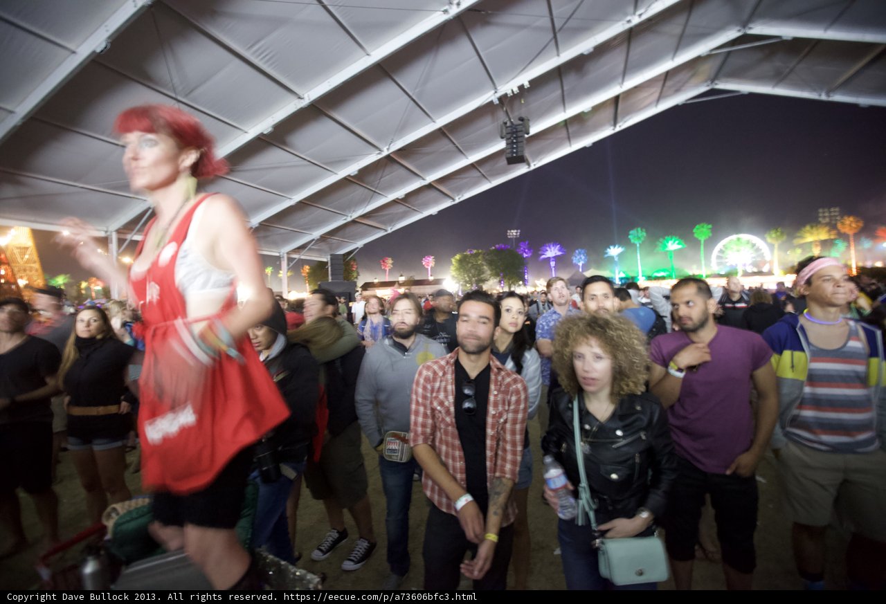 Nighttime Crowd Under Tent at Coachella Festival