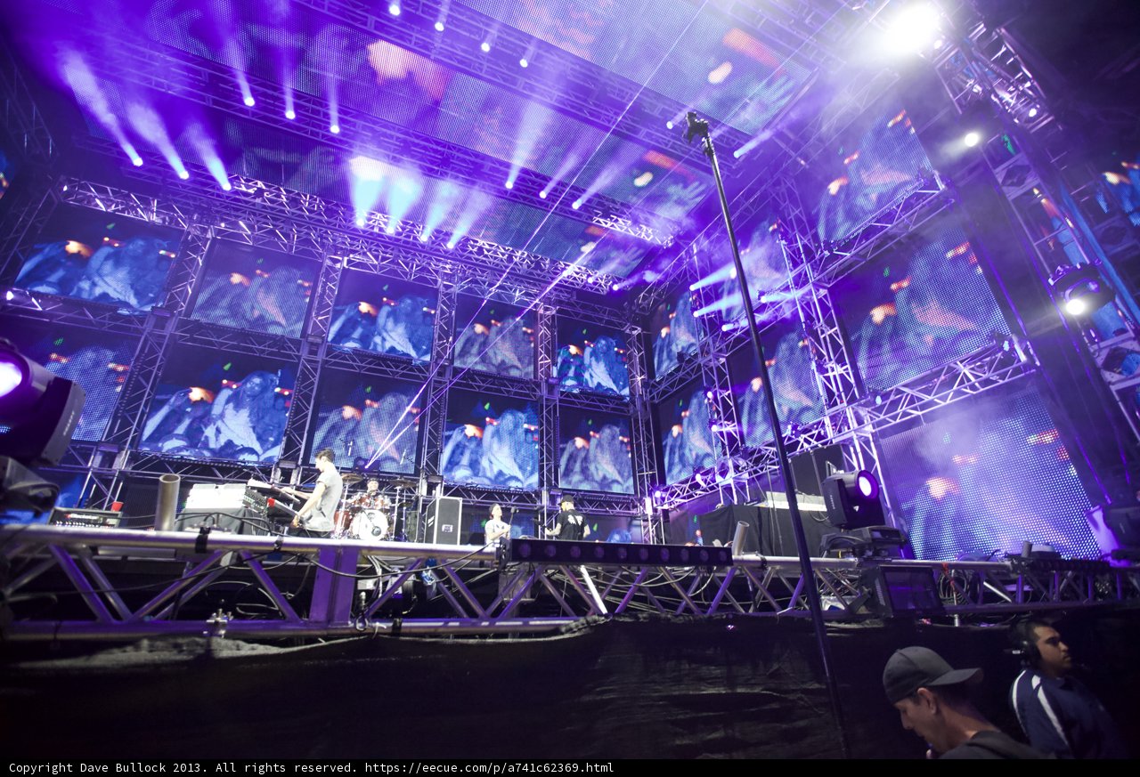 Purple Spotlight on Rock Concert Performance