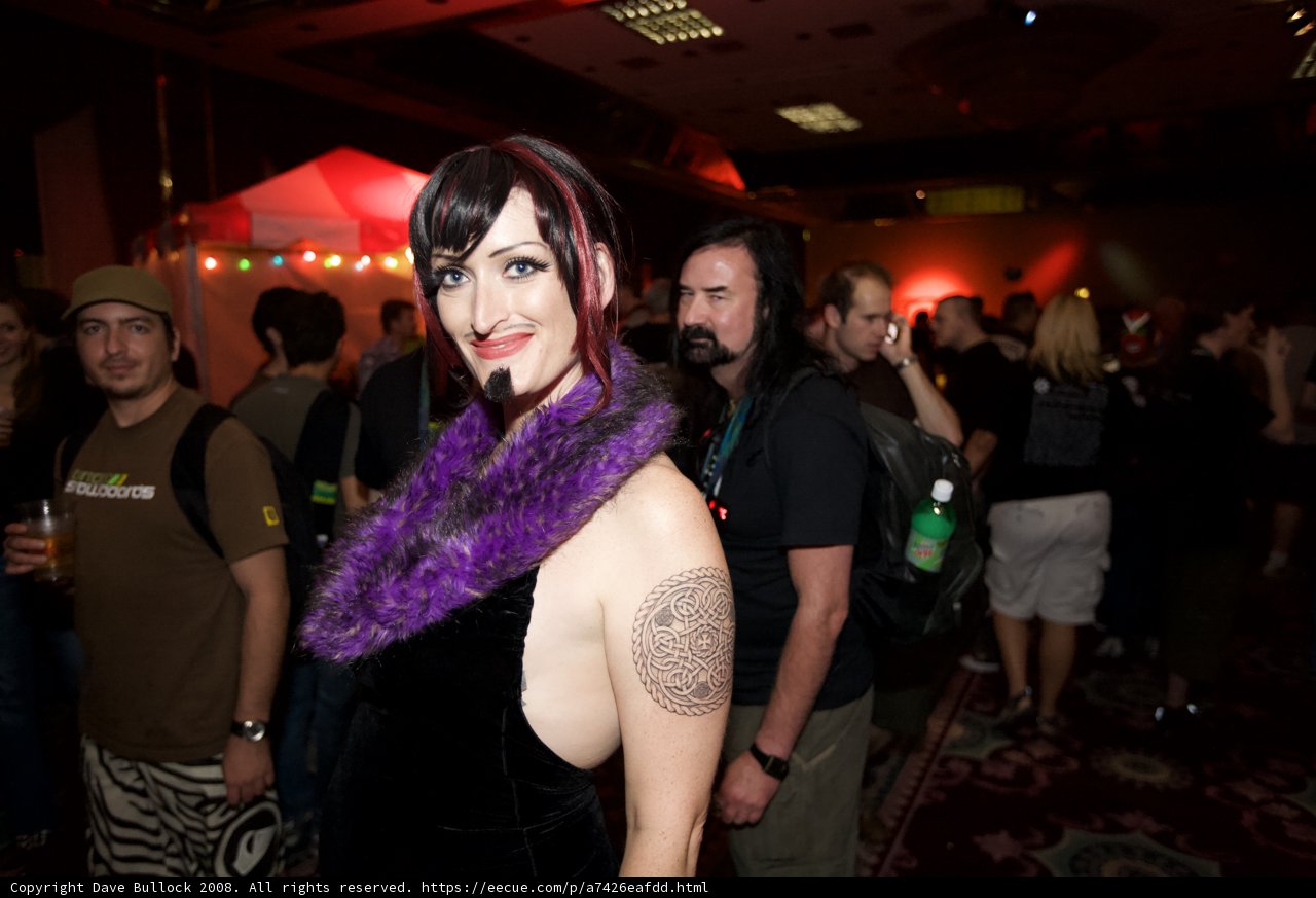Tattooed Woman in Purple Scarf