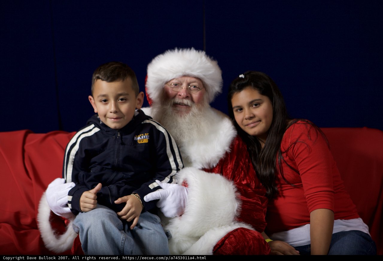 Santa Claus Spreading Holiday Cheer with Two Children
