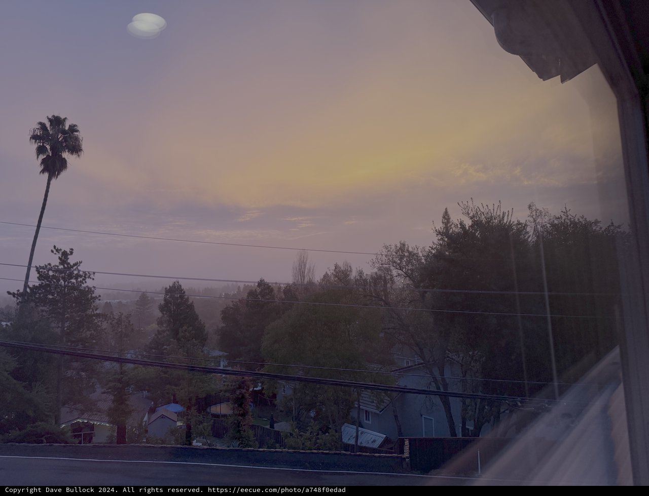 Misty Sunset View from Residential Balcony