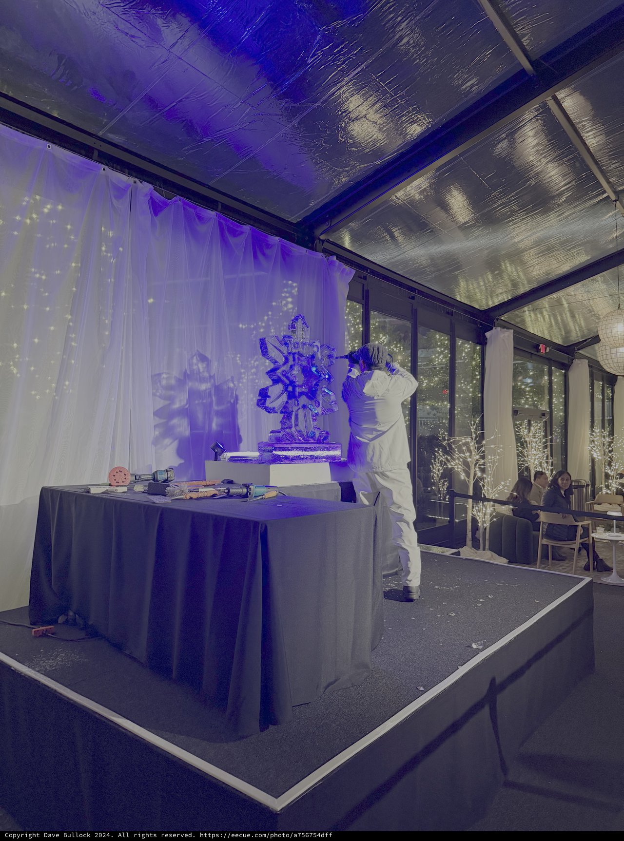 Chef Carving Ice Sculpture at Upscale Event