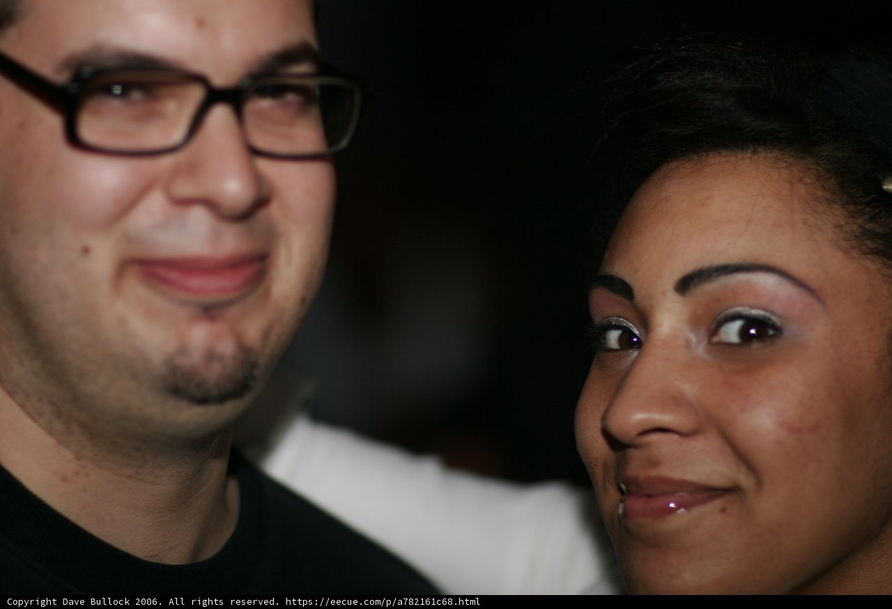 Smiling Couple with Stylized Eyeglasses