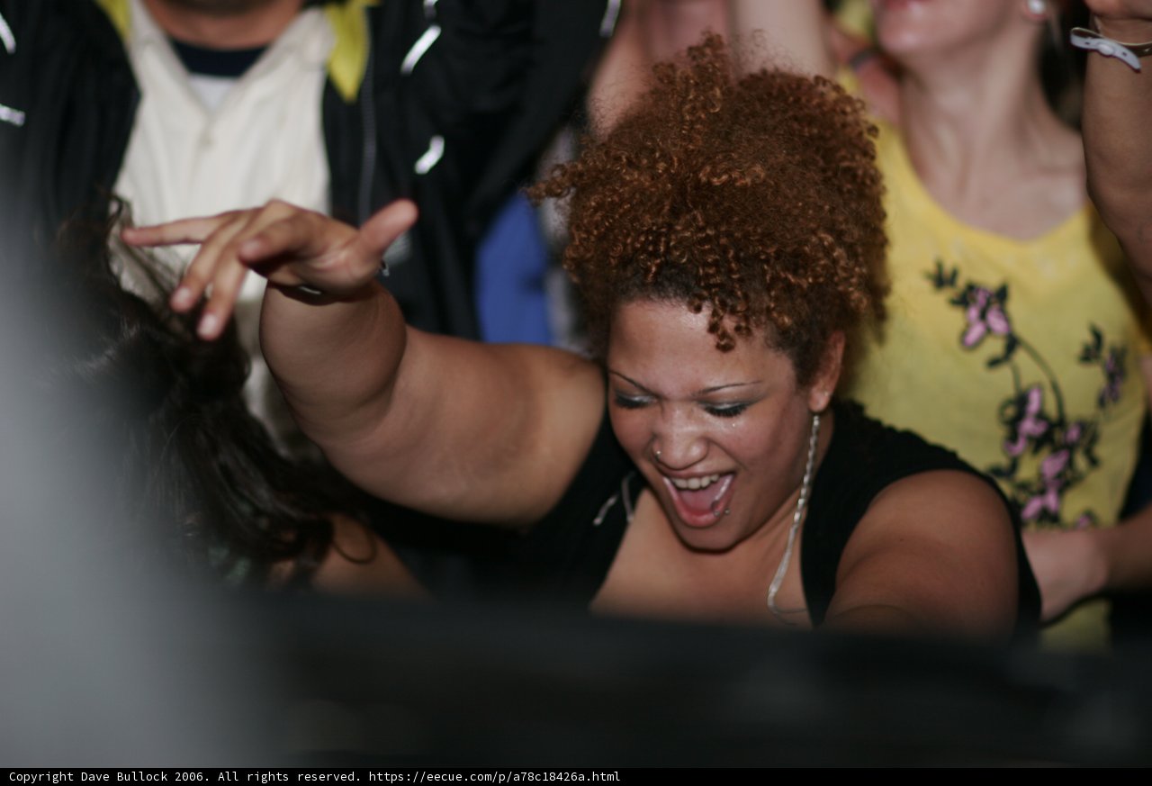 Curly-Haired Beauty on the Dancefloor