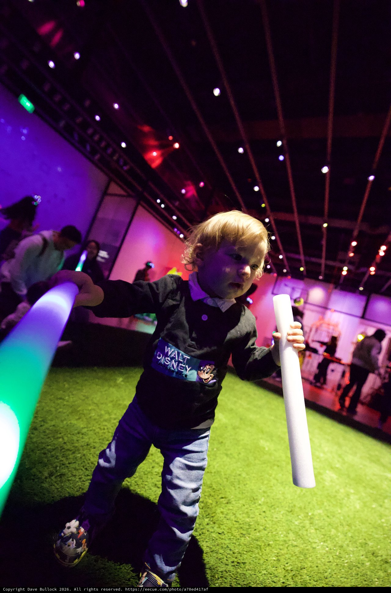 Toddler Dancing with Light Stick at Baby Rave