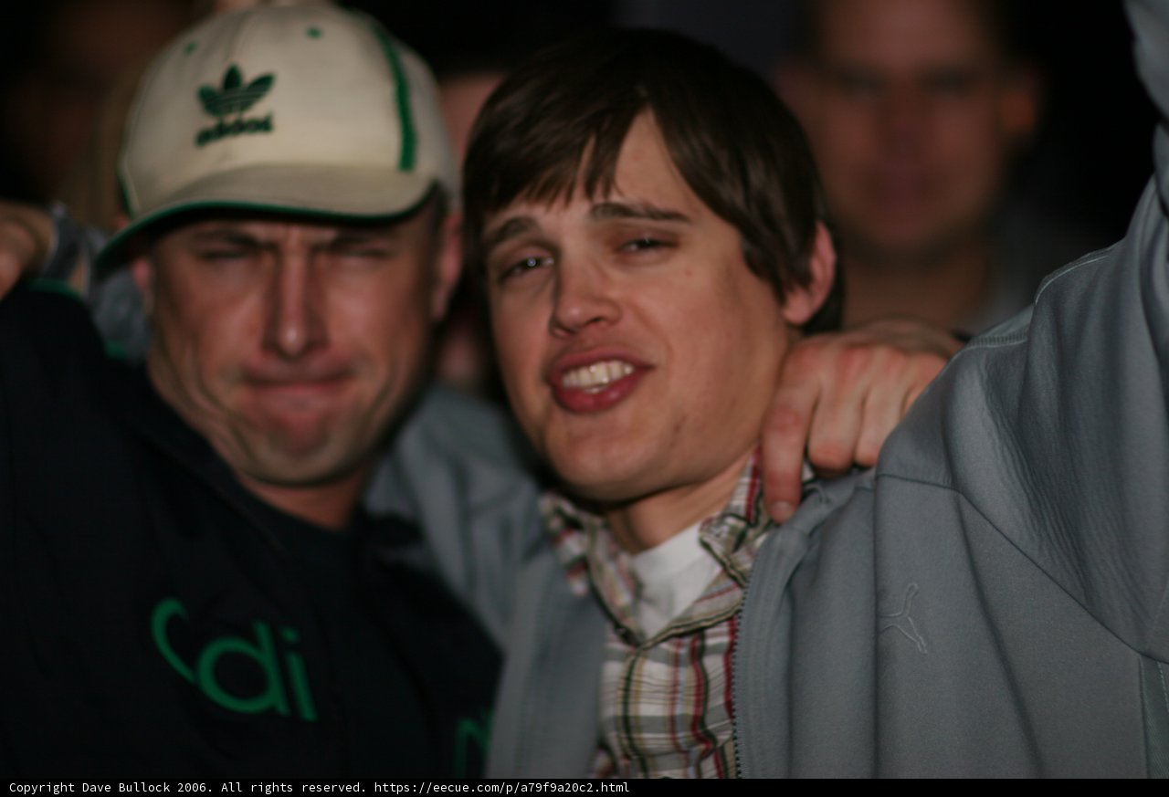 Grey Jacket and Baseball Cap
