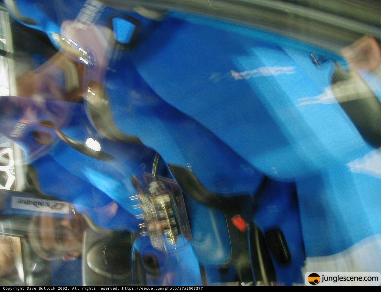 Blue Car with a Mysterious Passenger