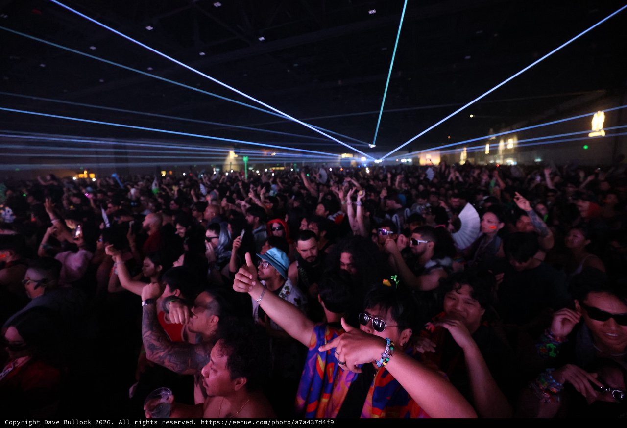 Massive Crowd Electrified by Laser Light Show