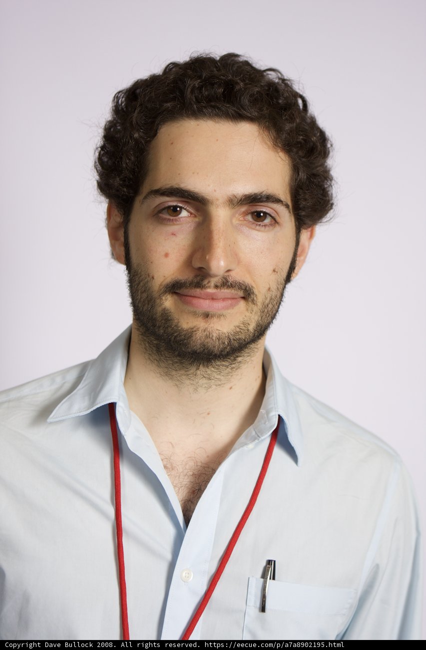 The Curly-Haired Gentleman in Red