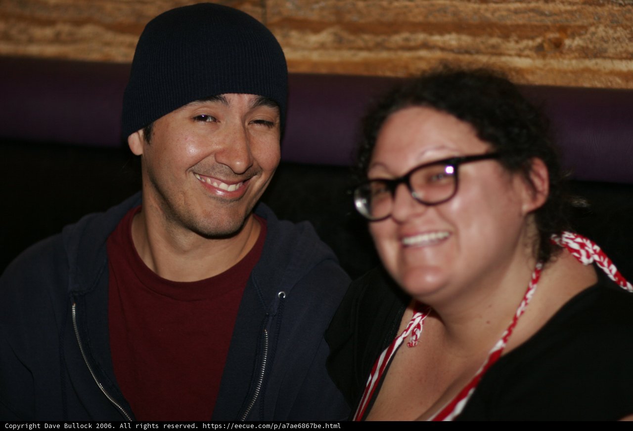 Smiling Couple in Cozy Headgear