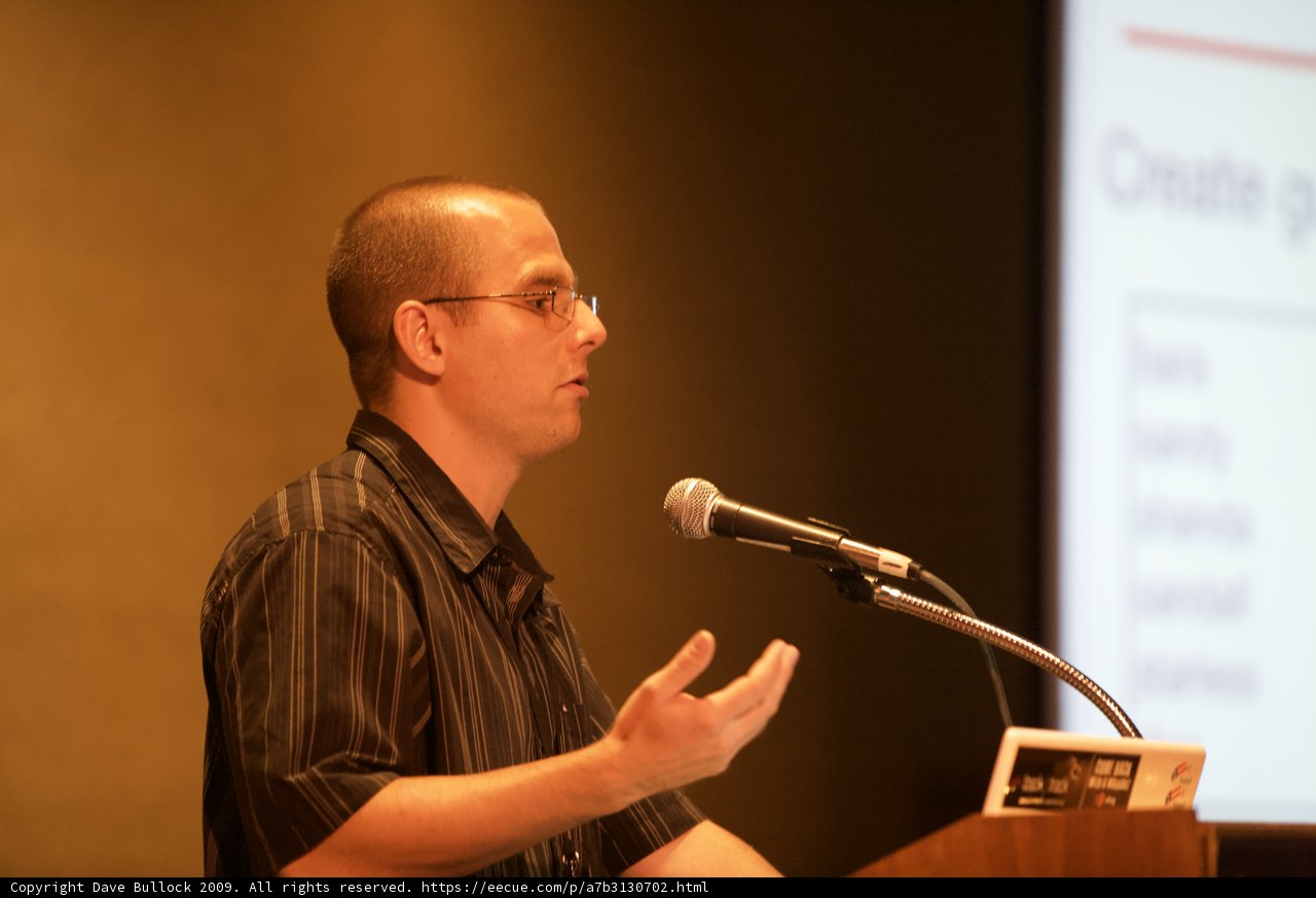 A Man Giving an Engaging Presentation to a Massive Crowd