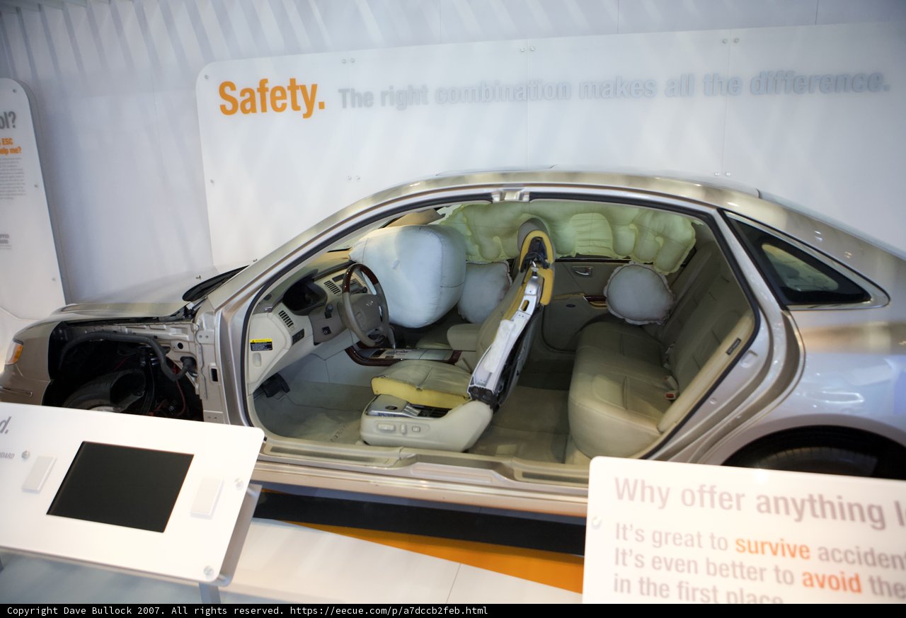 Safety First Caption: A car with a seatbelt and a seatbelt extender seen at the 2007 LA Auto Show, promoting the importance of driver and passenger safety. #automobile #car #transportation #safety #vehicle #LAautoshow #seatbelt #seatbeltextender