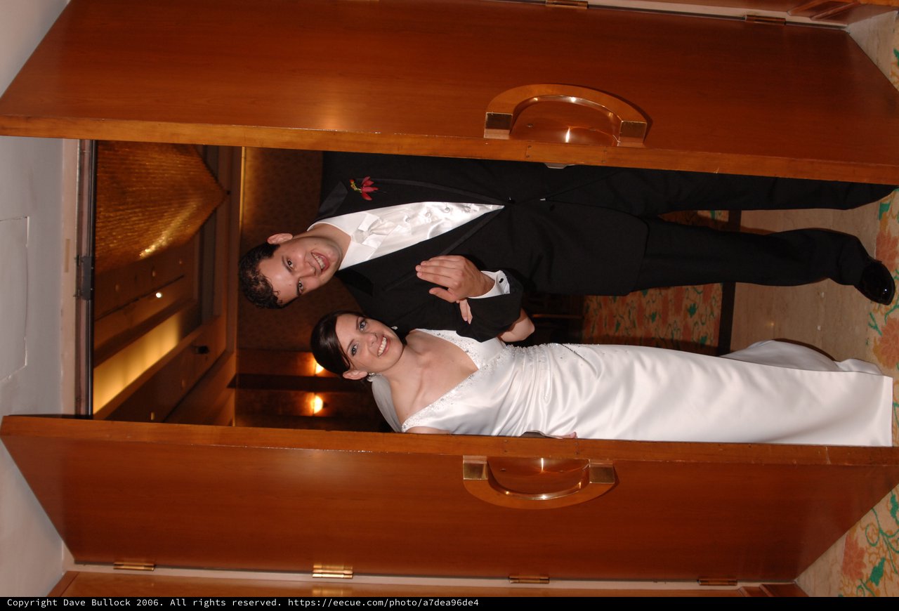 Newlyweds Emerge Through Grand Wooden Doors