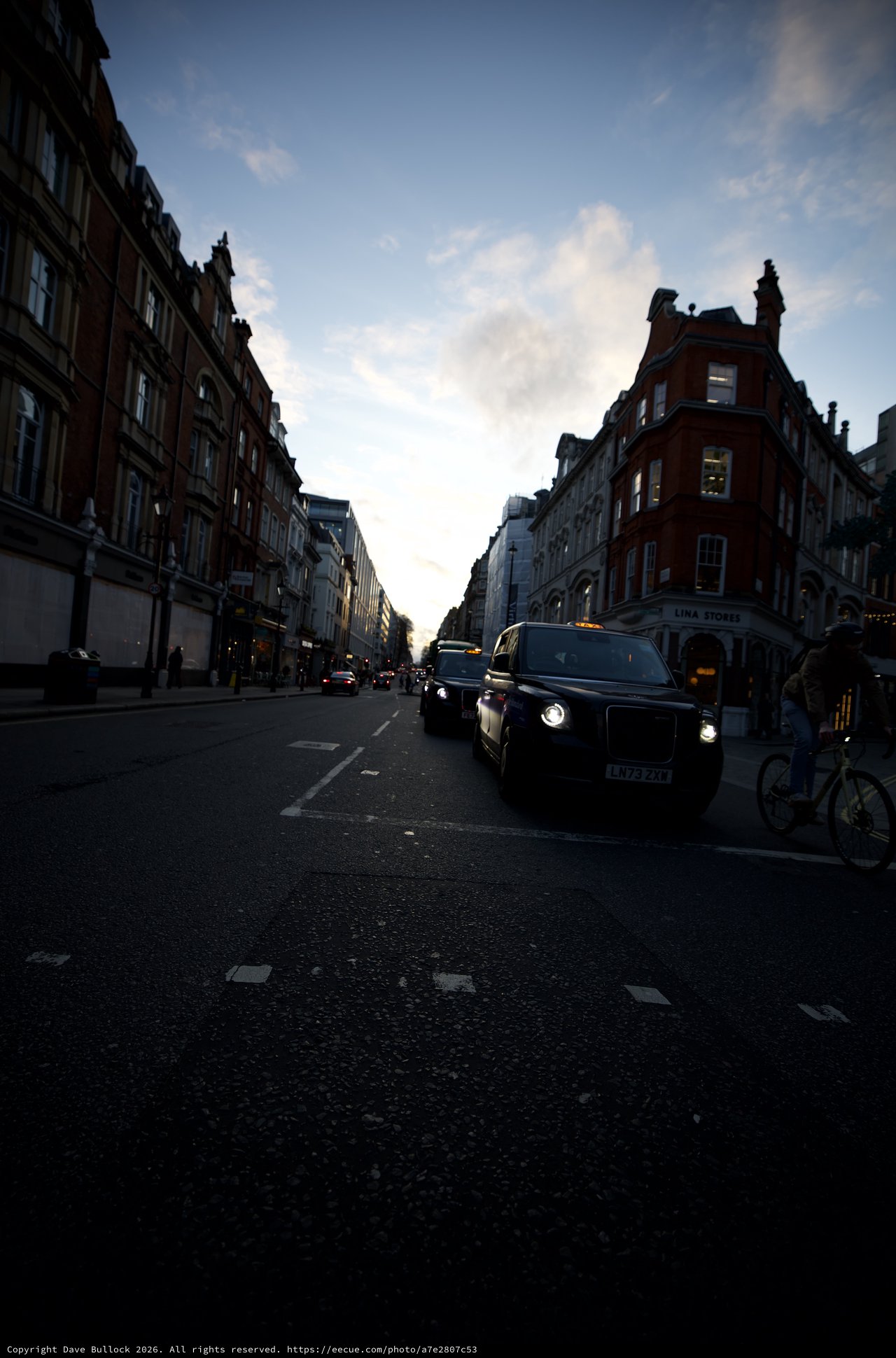Black Cab on London Street at Dusk