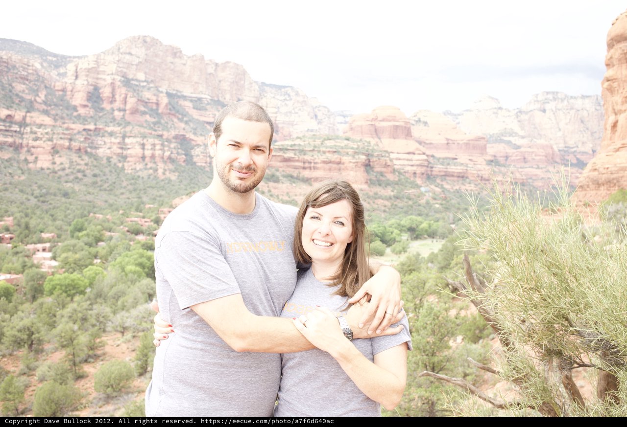 Couple Embracing Amid Sedona's Red Rock Splendor