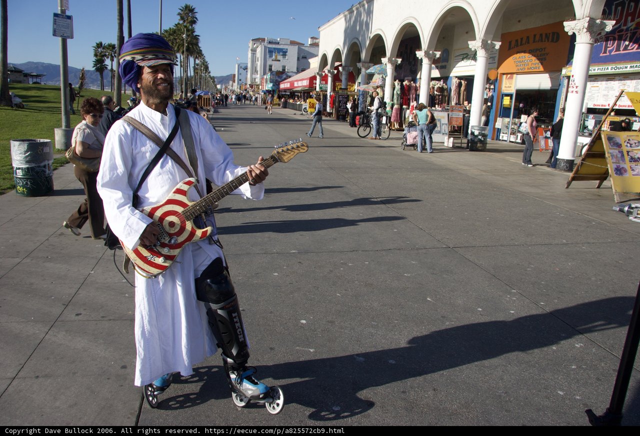 The Guitarist on the Sidewalk