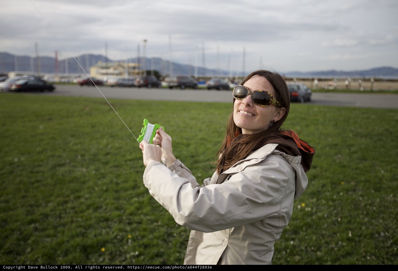 Woman Flying a Kite at San Francisco Waterfront