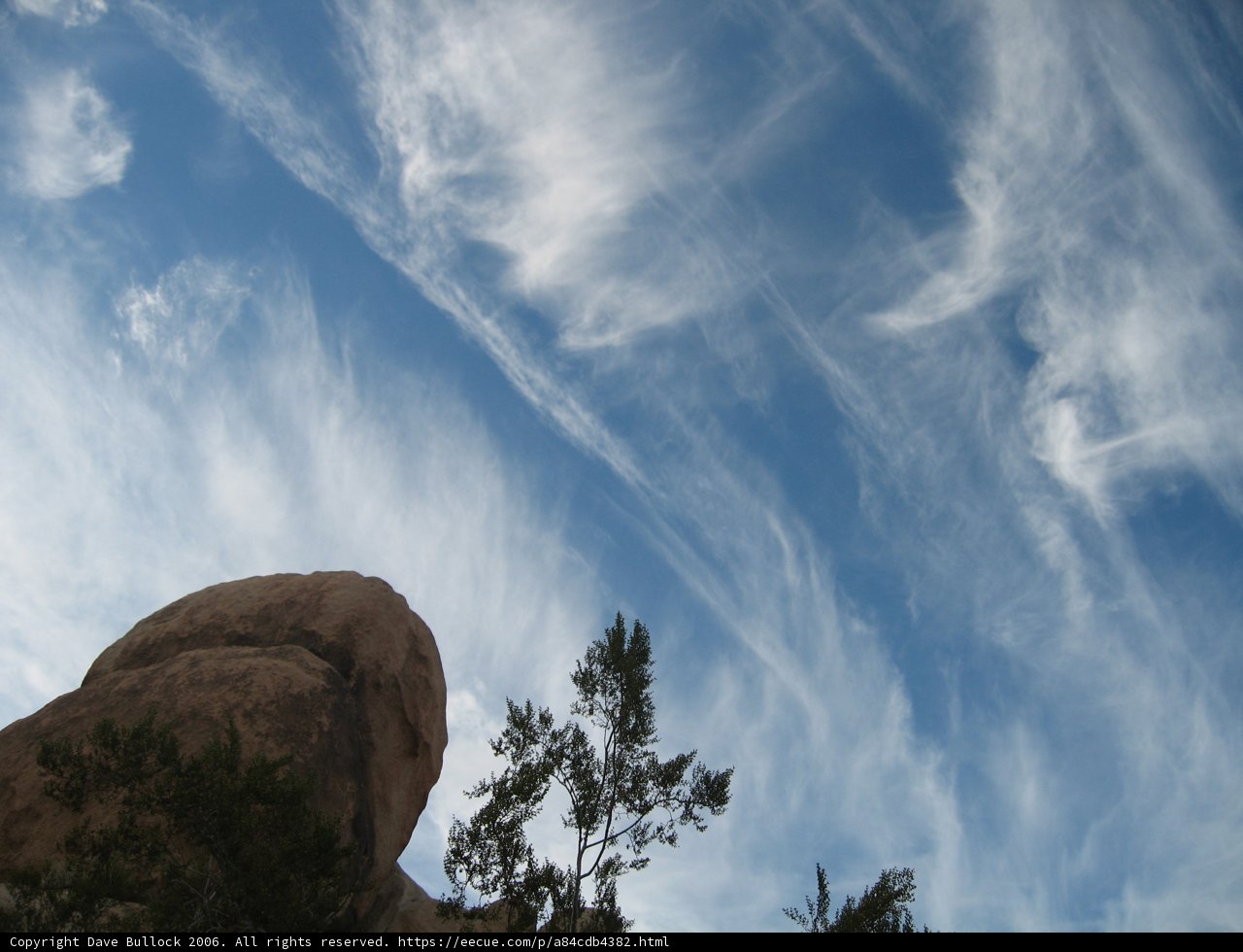 Serene Skies over Stony Terrain