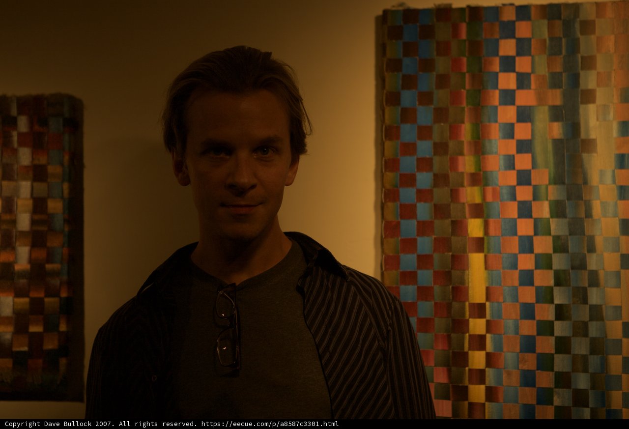 Standing Tall in Front of a Multi-Colored Wall