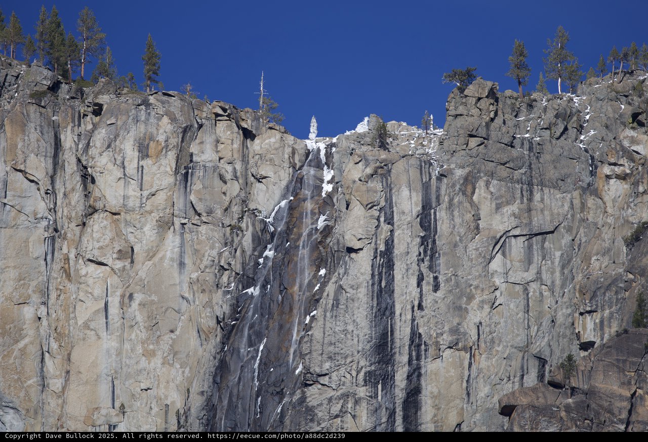 Frozen Waterfall Cascading Down Yosemite's Granite Cliffs