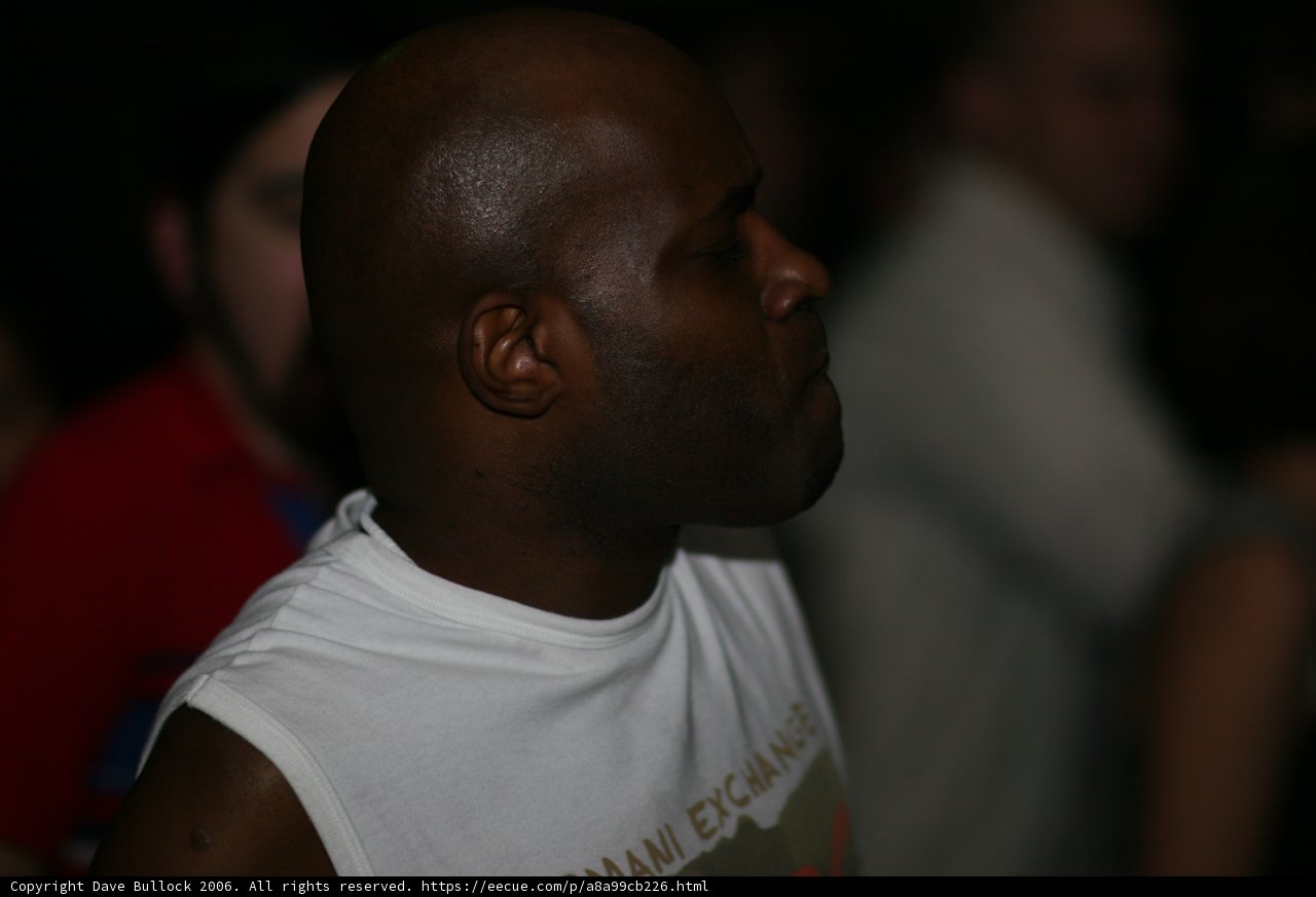White T-Shirt Bald Man