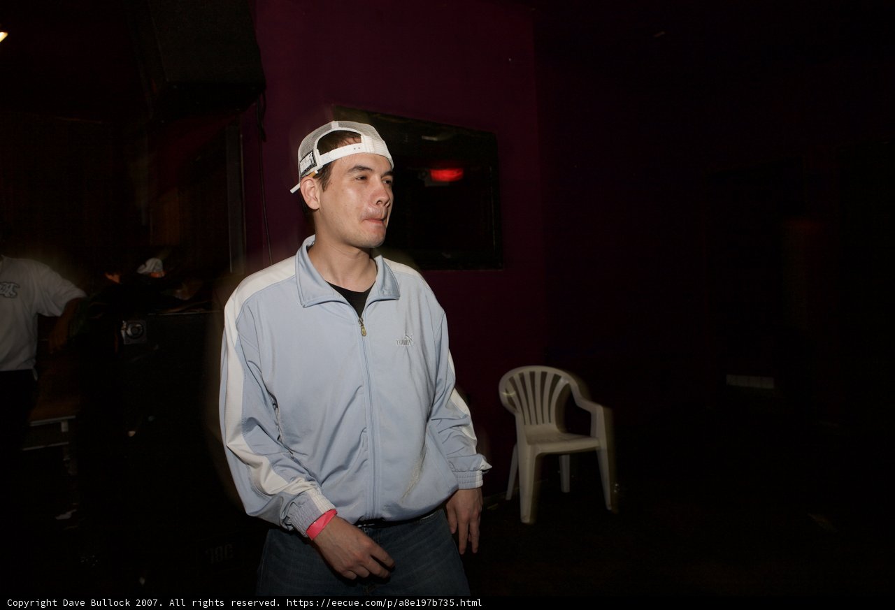 Respectful Man in White Hat and Jacket